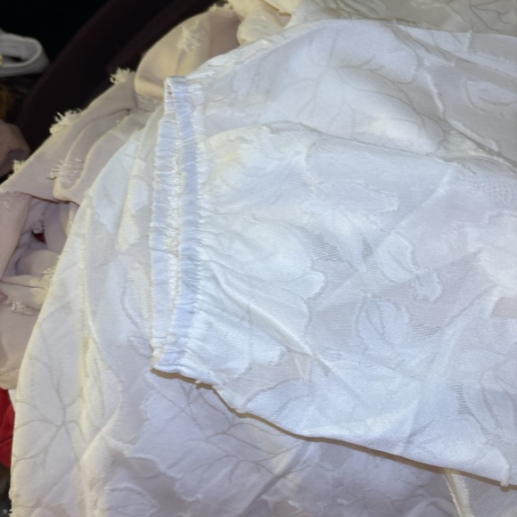 Zulily top in XXL has embossed flowers It’s  lining the sleeve are see-threw - Picture 11 of 15